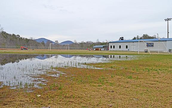 The practice fields at White County High School remain flooded Monday afternoon due to drainage issues. (Photo/Samantha Sinclair)