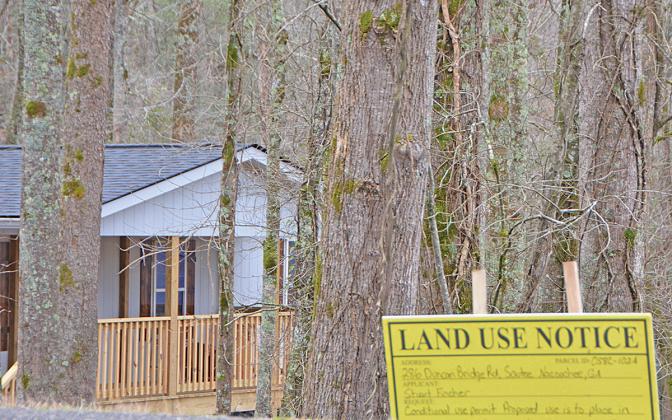 Many in the community have begun to dread seeing the yellow signs pop up that indicate someone is requesting a conditional-use permit for short term rental. (Photo/Linda Erbele)