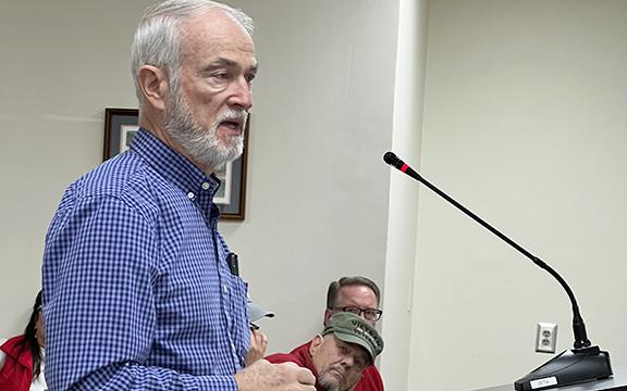 Larry Adams explains plans for a 47-unit subdivision on Claude Sims Road to the White County Commission. (Photo/Linda Erbele)