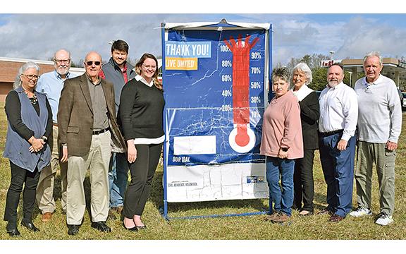 United Way of White County board members celebrating topping of the $80,000 fundraising campaign goal are, from left, Angie Jarrard, Mark Griffin, Dean Dyer, Nathan Eason, Taylor Burrell, Denise Loggins, Mary Isbell, Donald Harris and Gene White. (Photo/submitted)