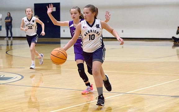 Ansleigh Vandiverdr dribbles by a Union County defender during the Class C 12U state championship game last Saturday at White County High School.  (Photo/Mark Turner)