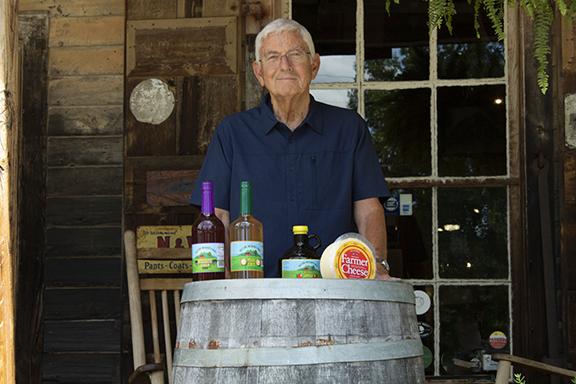 Bill Coen is commonly seen nowadays serving samples of cider outside of Old Sautee Store and sharing a happy tune. (Photo/Noah Johnson)