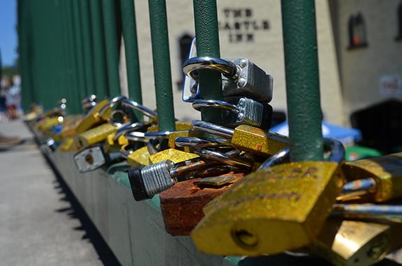 Love locks have been adding thousands of pounds of extra weight to the bridge over the Chattahoochee River. (file photo)