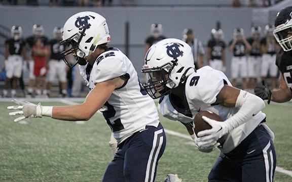 Jason Rewis, left, escorts Isaiah Whitlow down the sidle after Whitlow striped the ball away from a Chestatee runner and took the fumble for a touchdown . (Photo/Mark Turner)