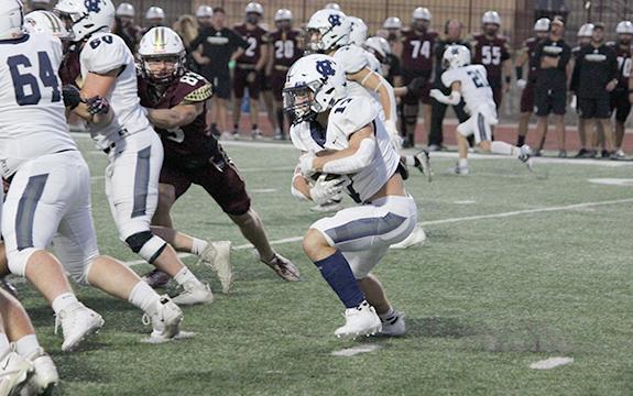 Ryan Fowler rushed for 203 yards and had two  touchdowns in the Warriors' region win over Dawson County.  (Photo/Mark Turner)