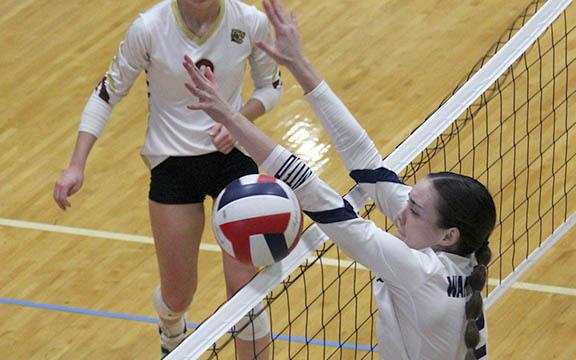 Sarah Blair blocks a shot during the 7-AAA tournament last week at WCHS. (Photo/Mark Turner)