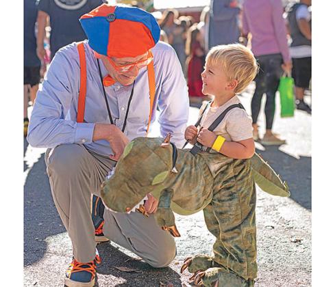 Fun began last weekend at events like Cleveland First Baptist Church’s Fall Festival where Senior Pastor Dr. Phil Weaver shares a laugh with Braxton Frederick. (Photo/ Diane Fenlason)