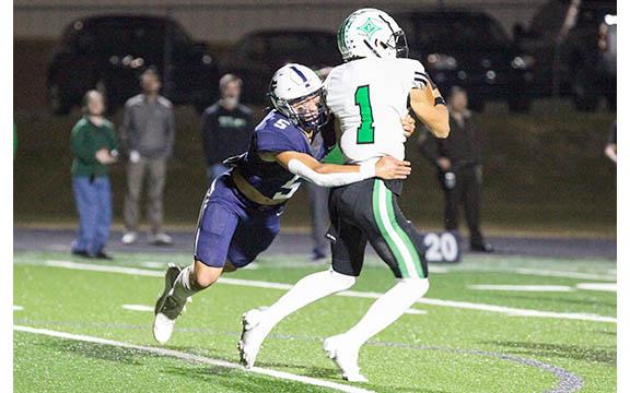 WCHS linebacker Jon Scott, left, brings down Pickens' McCord Purdy during the first half. (Photo/Staci Sulhoff)