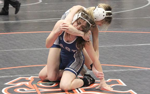 WCHS junior Ollie Weiland takes down East Jackson's Seanna McCarthy during a match in the 110-pound division at the Chestatee event. (Photo/Mark Turner)