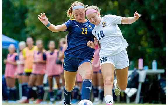TMU midfielder  Eliska Dvorakova, right,  was second in the nation in assists this season.  (Photo/TMU Athletics)