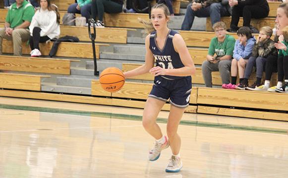 Zoe Burkett, above, and the Lady Warriors take on No. 2 Wesleyn in region showdown next Tuesday in Cleveland.  (Photo/Mark Turner)