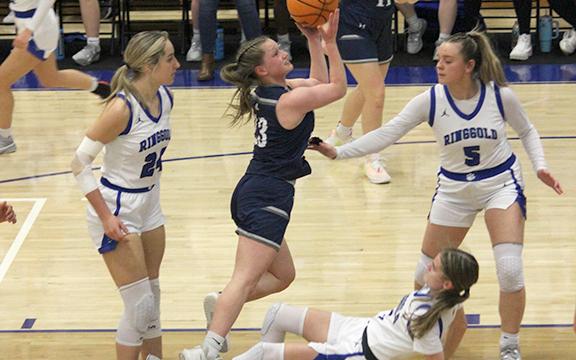 Mya Yeh goes through three Ringgold defenders on the way to the basket Tuesday during the first round of the Class AAA state tournament. (Photo/Mark Turner)