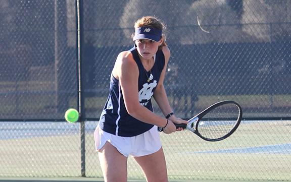 Aubrey Bolton returns a serve during her win in the No. 2 singles match Tuesday against Gilmer. (Photo/Mark Turner)