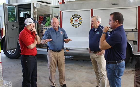 Banks County Captain Chad Nix, and White County’s David Murphy, Terry Goodger and Travis Turner discuss the building of Banks County Fire Station No. 41. (Photo/Eric Tiongson)