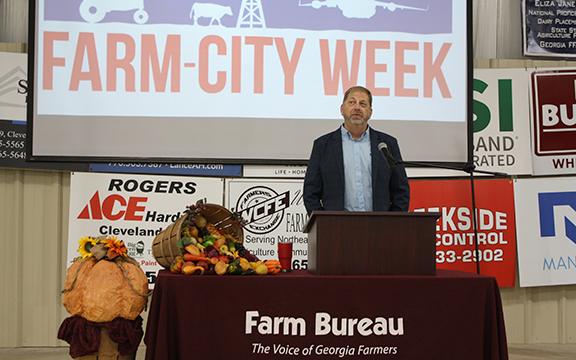 White County Farmers Exchange President Gilbert Barrett gives a speech thanking farmers for their work. (Photo/Eric Tiongson)