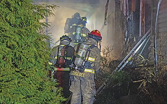 Lieutenant Shad Sosebee and the White County fire services team work to quell the weekend fire.