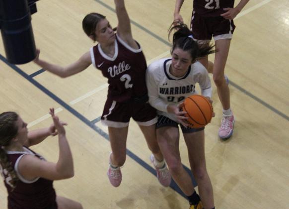Kylie Watkins looks to score in the low post during the matchup with Dawson County.  (Photos/Mark Turner)