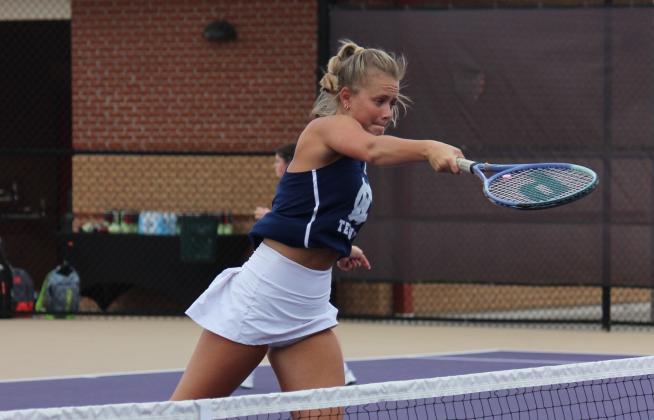 Sarah Jarrard finishes off a slam t the net during the Lady Warriors' win over Lumpkin County Tuesday morning at the 6-AAA tournament in Dahlonega. (Photo/Mark  Turner)