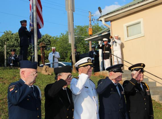 The White County Honor and Color Guard presented a 21 gun salute and performed Taps during a ceremony to honor Purple Heart recipients on May 8. From left are Bob Bardenwerper, Dave Fortner, Garey Huff, Tommy Chastain and Larry Clark. (Photo/Denise Etheridge)