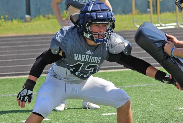 Easton Drew goes through a linebacker drill during practice last week. (Photo/Mark Turner)