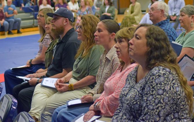 Finalists for the White County School System Employee of the Year await the final verdict.