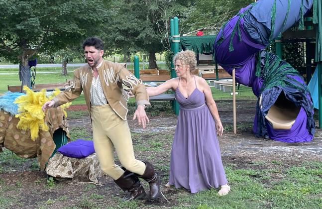 Richard Canal Tinius as Demetrius tries to escape the clutches of Helena, played by Mary Emily Deal. (Photo/Jerry Grillo)