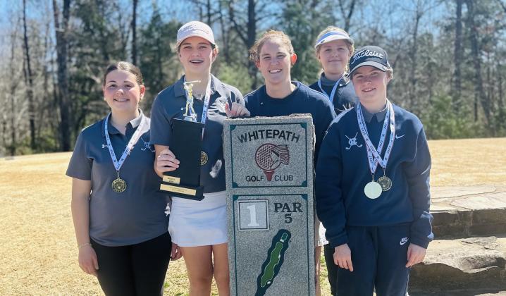 Golf champs! The White County Middle School girl's golf team captured the Mountain League championship in March at Whitepath Golf Club in Ellijay. The team title was the second straight league championship for the Lady Warriors, who are coached by Courtney Attaway. Annabelle Head, Lily Ellis, McKinley Holland and Grace Hollis competed in the tournament for the WCMS team. The duo of Head and Ellis combined to post a 108 team score to give the Lady Warriors the win. Head was the low-medalist for the second st