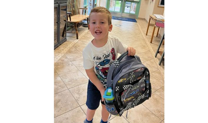 Nathan Lawson is raring to go with his race car backpack at Mount Yonah Elementary. JANE GRILLO/SPECIAL