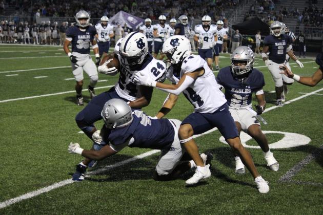 Noel Lammers battles for some yardage during the non-region game with East Jackson last Friday in Commerce. MARK TURNER /WCN