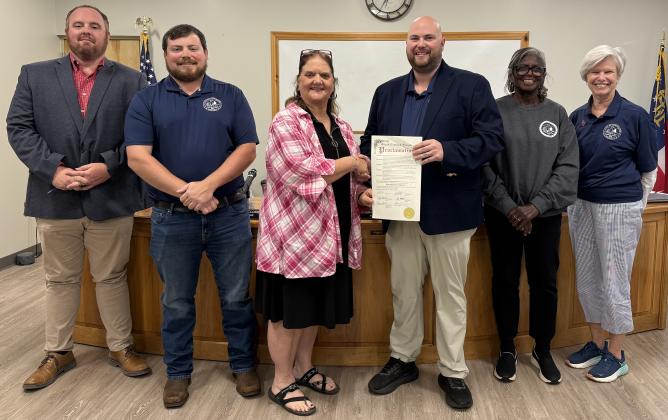 The Cleveland City Council proclaimed Sunday Nov. 2 as Retired Educators Day at its Oct. 20 meeting. From left are commissioners CJ McDonald and Jeremy McClure, retired teacher Debbie Petty, Mayor Josh Turner, commissioners Annie Sutton and Nan Bowen (also a retired educator). LINDA ERBELE/WCN