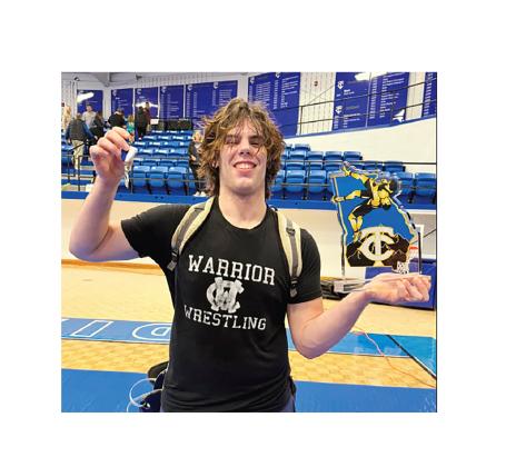 Connor Armstrong shows off his hardware after winning the 215-pound title and being named the Most Outstanding Wrestler the King of the Mountain tournament. WCHS WRESTLING/SPECIAL