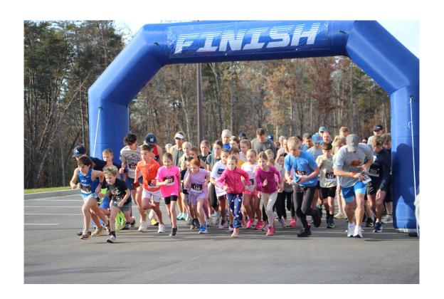 Runners aged 7 to 82 take off from the starting line at the inaugural White County Turkey Trot. PHOTOS BY CARLY HENDERSON/WCN.