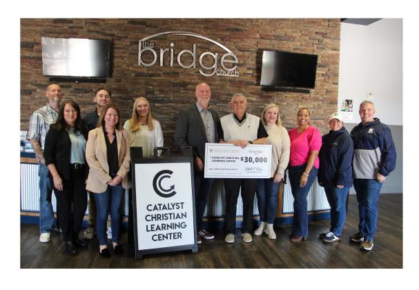 Staff at Catalyst Christian are presented with their $30,000 grant check from the North Georgia Community Foundation.