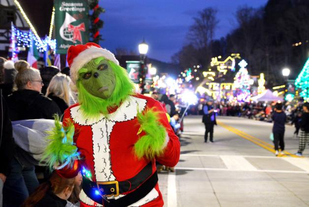 The mischievous Mr. Grinch amuses visitors to Helen during the city's Christmas parade on Dec. 13.