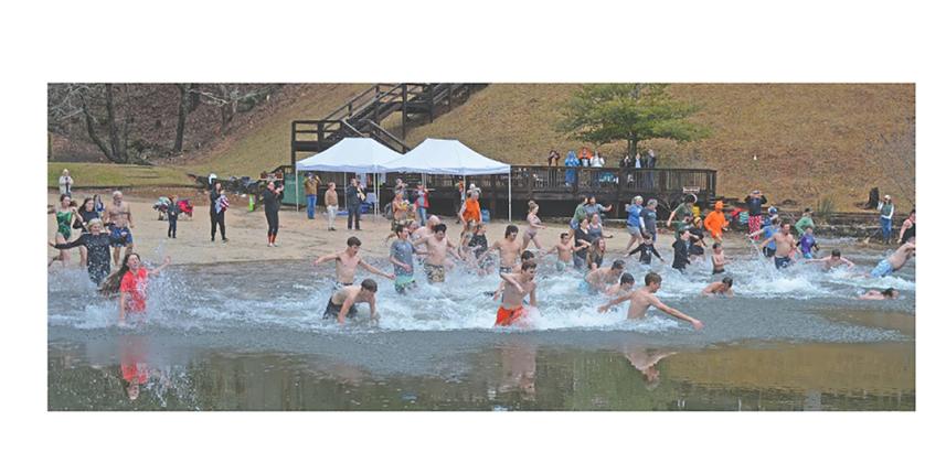Winter Bear Plunge participants greet a new year during the 2025 Winter Bear Plunge at Unicoi State Park’s beach. FILE PHOTO