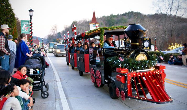 Children enjoy a ride on the Alpine Express just prior to the Helen Christmas Parade on Dec. 13..