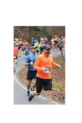 Ron Coker, construction manager for Habitat for Humanity of Northeast Georgia, runs in the 2025 Hogpen Hill Climb. SUBMITTED PHOTO