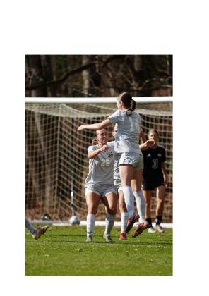 The Lady Bears, including Ariana Marfell, No. 26, and Isabella Hodson, No. 14, shown during an NAIA tournament game.