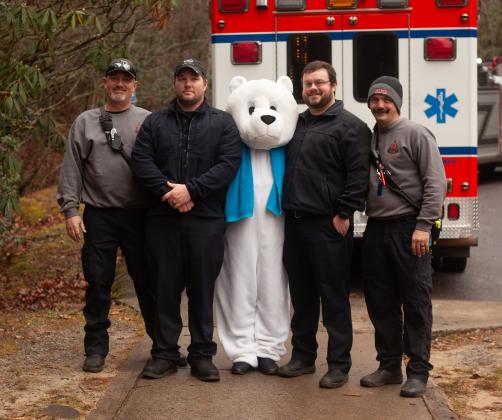 The Winter Bear Plunge mascot hangs out with first responders at Unicoi State Park on Jan. 3. PHOTO COURTESY OF JESSI TAYLOR/UNICOI STATE PARK