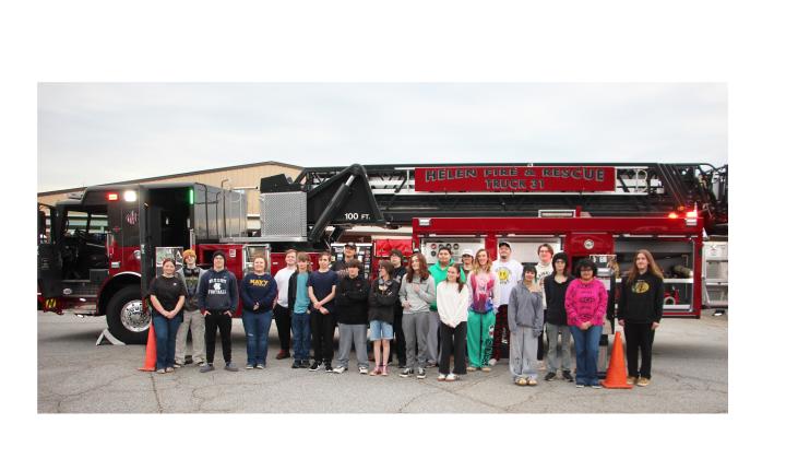 Students at Mountain Education White Campus were able to learn about the Helen Fire Department’s $1.8 million fire truck and see it extend its 100-foot long ladder. CARLY HENDERSON/WCN
