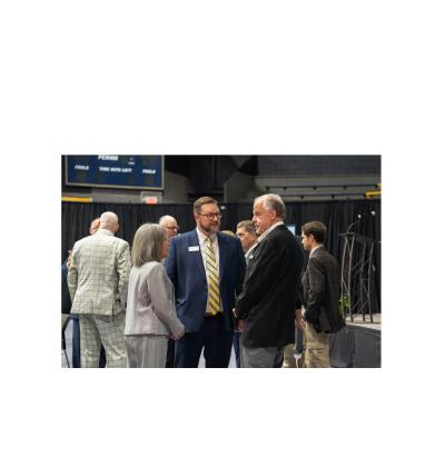 Dr. Larry Lyon, center, speaks with Truett McConnell University supporters Carol and Tom Abernathy during last Saturday's event. SUBMITTED PHOTO