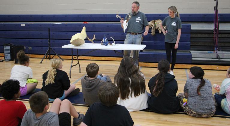 ason Moon of Moon’s Taxidermy shows students a variety of mounts at MCES Career Day.