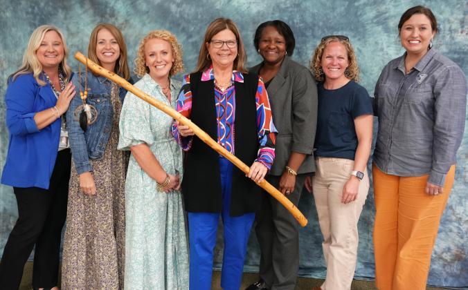 The White County Board of Education recognized numerous individuals during a March 26 school board meeting. Above, Former Superintendent Laurie Burkett was presented the spirit stick by the system’s school principals last week. From left: Natalie Carpenter, Laura Hall, Juliana Dean, Burkett, Nara Allen, Mary Anne Collier and Noel Cochran. SUBMITTED PHOTOS