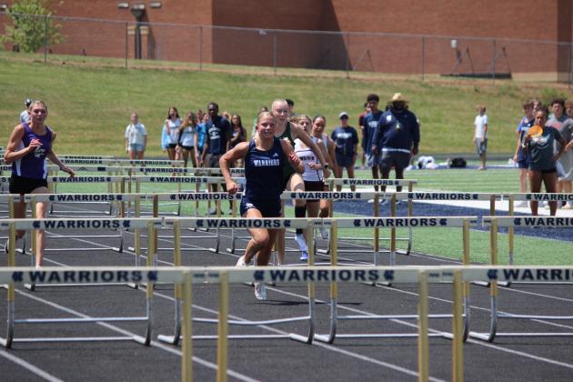 Katana Rickett won the 100-meter hurdles during the final day of the region meet. MARK TURNER/WCN