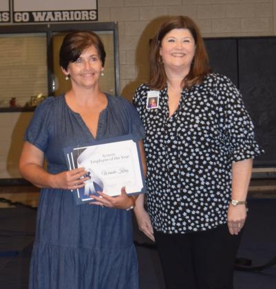 Wanda King, left, was presented with the White County School System Employee of the Year award. White County School Human Resources Director Laura Corley is at right.