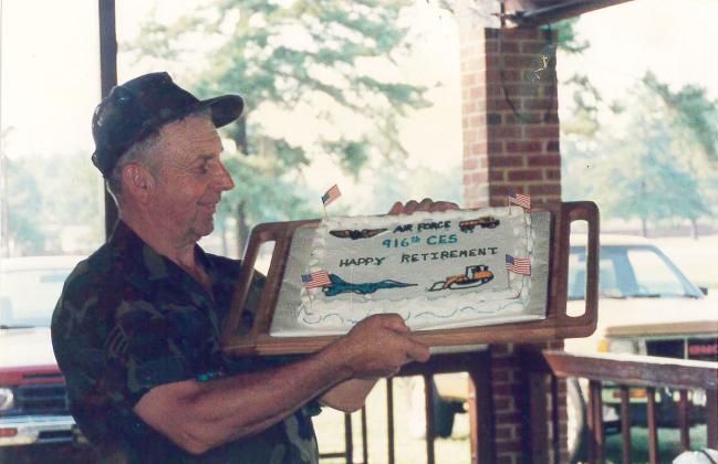 Whelchel Meaders celebrates sweet retirement with a cake from the Georgia Department of Transportation after decades of employment following his extensive military career. SUBMITTED PHOTO