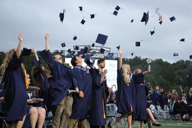 Graduates throw their caps into the air at the conclusion of the 2026 White County High School graduation ceremony. CARLY HENDERSON/WCN
