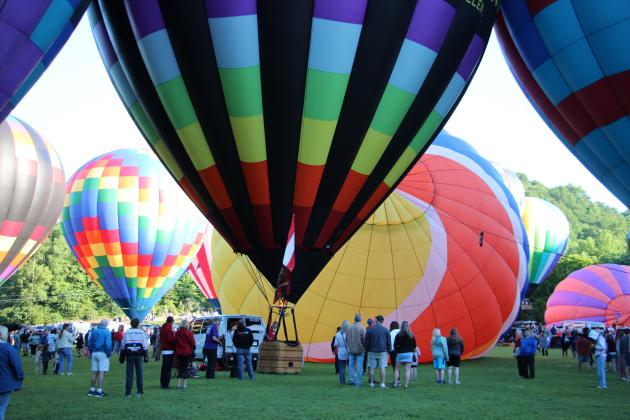Spectators and balloon crews gather in Helen for the 53rd annual Helen to the Atlantic Balloon Race &amp; Festival on June 4. Around 20 balloons are participating in events throughout the weekend. CARLY HENDERSON/WCN