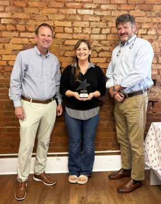 White County News general manager and marketing specialist Erin Etris, center, received the Tom Tucker All-Star award for 2025 on June 3. Regional Publisher Keith Barlow is at left, and CNI Chairman Alan NeSmith is at right. CARLY HENDERSON/WCN