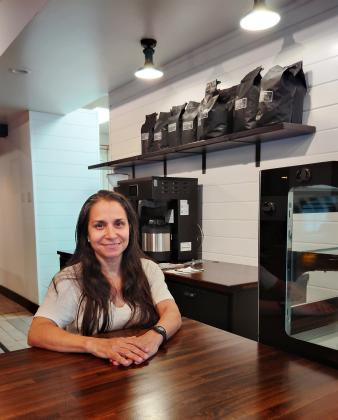 Marilyn Martin and her husband Stephen Martin, not pictured, own Farmhouse Coffee in Cleveland. The coffee shop will open its larger space on Friday, June 12. DENISE ETHERIDGE/WCN